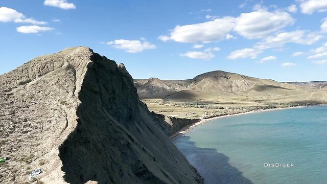 Stunning outdoor blowjob with epic mountain cliff and turquoise sea view