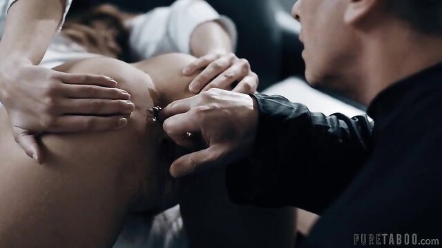 Woman getting butt plug inserted by man in Pure Taboo scene