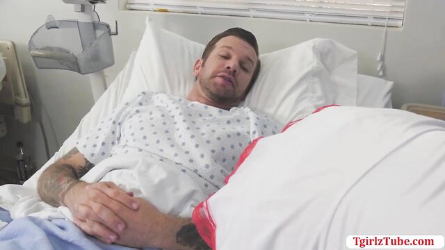 Korra Del Rio as nurse with tattooed patient in hospital bed