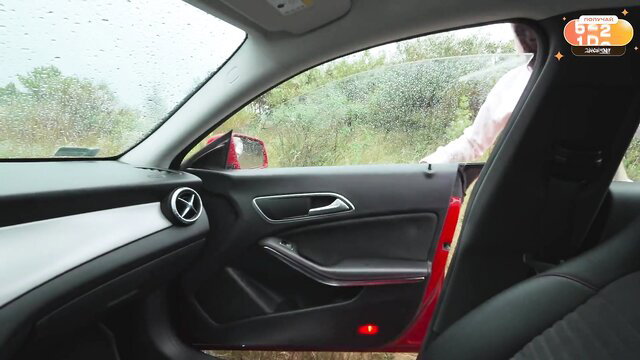 Nikky Dandeli in rainy car door open white dress upskirt view