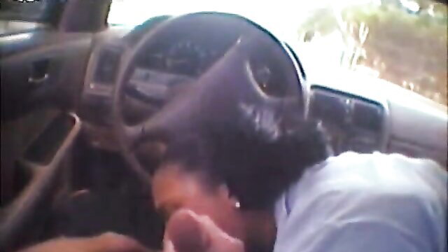 Black babe giving epic car blowjob, head down on lap in driving POV