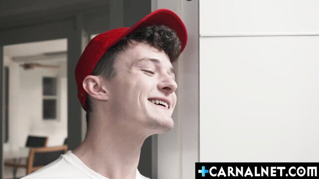 Ace Banner grins in red cap, white tee before Ducati tops coach