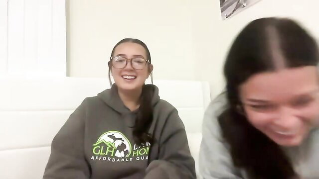 Starqueenieee Latina camgirl teen smiling in hoodie with friend laughing