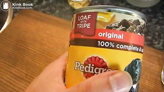 Slave woman eating Pedigree dog food loaf from can, kink fetish