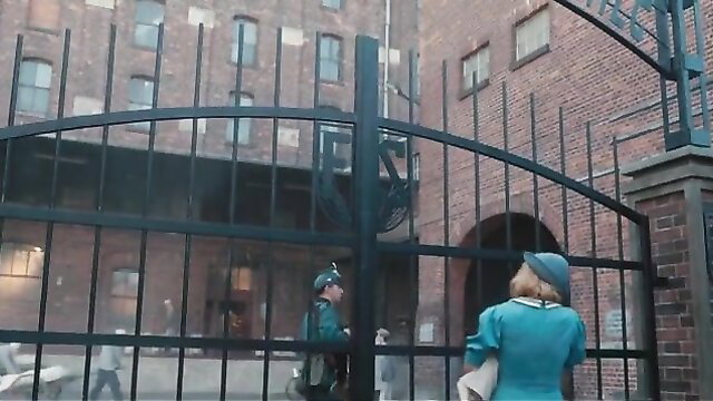 Sylwia Skrzypczak in hat and dress at prison gate, Pani od polskiego