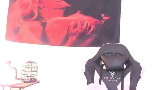 Cyberia goth cam girl in gaming chair, tattooed small tits nude tease