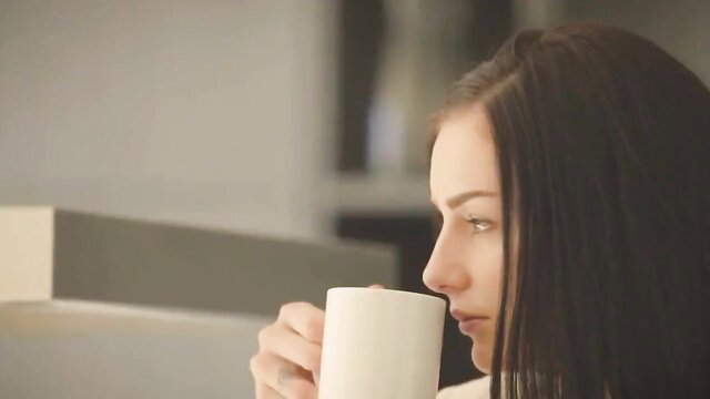 Amanda Lane milf sipping coffee profile view big tits