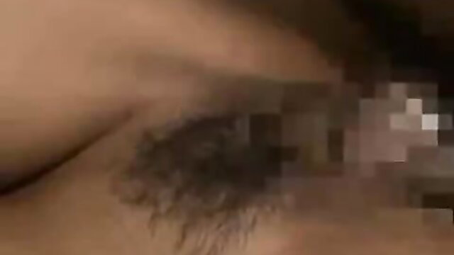 Closeup of Japanese woman's sultry eye in JAV bank robbery scene