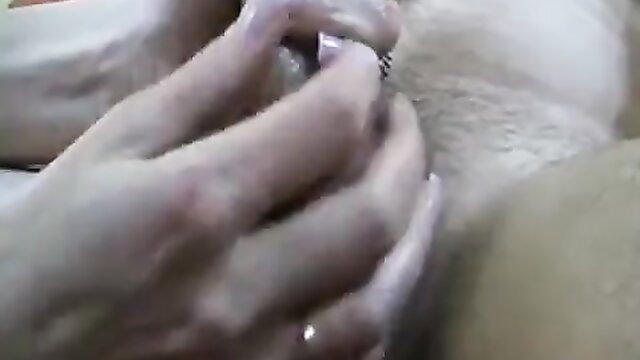 Closeup handjob on cock by mature woman fingers
