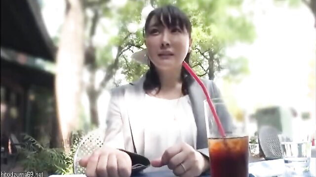 Asian office lady with ponytail sips iced coffee outdoors, JAV style
