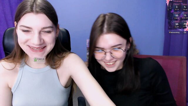 pure_radiance1 and friend smiling in tank top on cam, teen couple tease