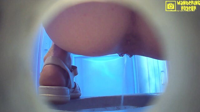 POV voyeur of hot woman peeing in toilet, squatting with ass spread