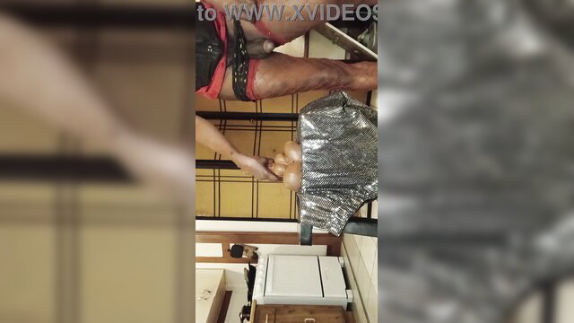 XXL Tgirl solo strokes huge cock in red lingerie