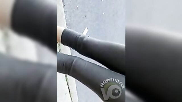 Candid cameltoe of sporty girl in tight black workout pants