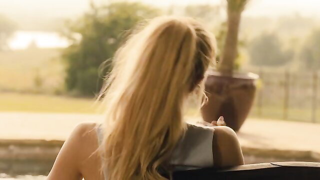 Ali Larter blonde ponytail back view in sexy tank top Landman nude scene