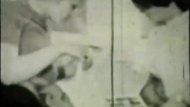 1960s retro couple in stockings exhibition sex through glory hole