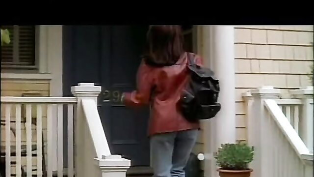Elizabeth Cromwell in red leather jacket and jeans at door, The Strangler's Wife 2002