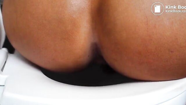 Nath Wyld's big black ass on toilet shitting closeup