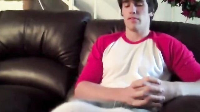 Xander loses bet in foot fetish scene, relaxed on couch