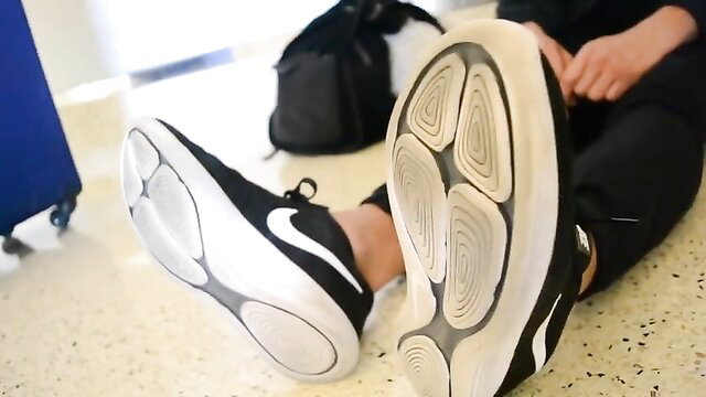 Graham H American student barefoot soles toes closeup