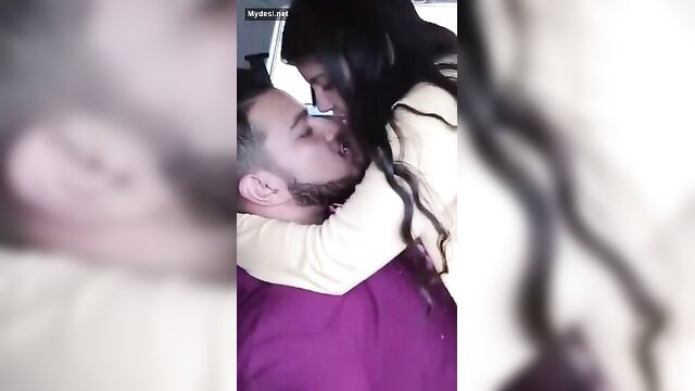 Indian dark-haired amateur babe passionately kisses bearded stud close-up