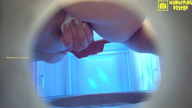 POV voyeur of busty woman squatting over toilet in Porta Potty