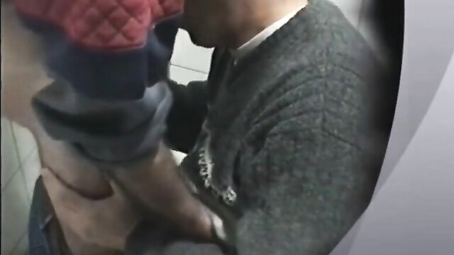 Amateur footjob closeup: woman's foot strokes man's bulge in public