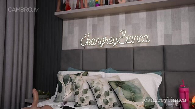 Jeangreybianca on bed in lingerie, solo tease CB cam show