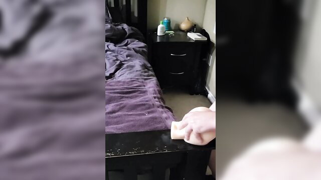 Amateur closeup of tight pussy spread by hand on bed