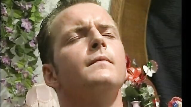 Closeup of mature granny with flowers in hair, jizzed face in HD