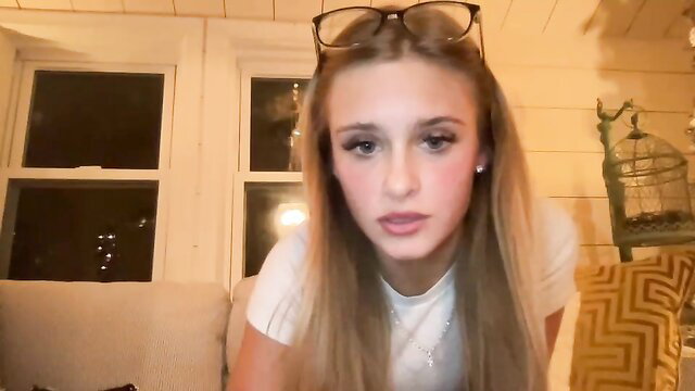 Carlybora cute innocent blonde in tight white top, glasses closeup