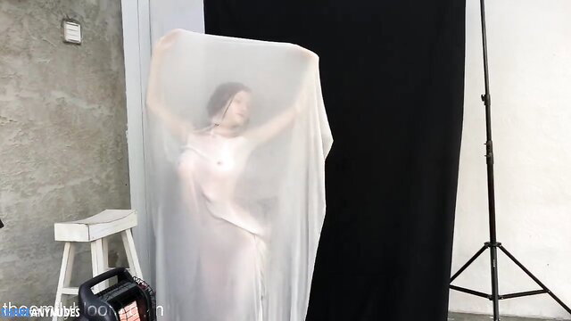 Emily Bloom nude body art pose with sheer fabric, leaked video