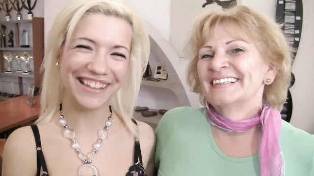Bibi Noel smiling with old lady Sally G in sexy top