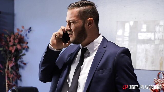 Handsome suited man on intense phone call in Mia Malkova scene