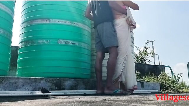 Villagesex91 Indian wife embraced by man outdoors by water tanks