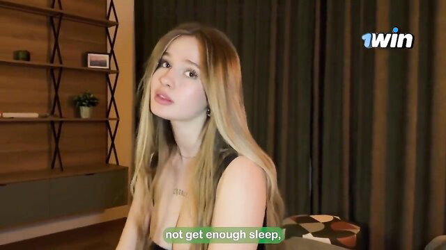 Sleepy Russian bombshell with huge tits in tank top closeup