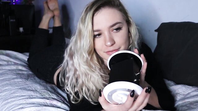 Rose ASMR blonde babe in black holds fleshlight, ear licking feet fetish tease