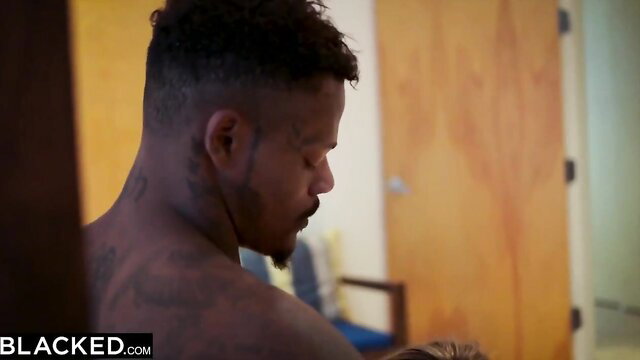 Lena Paul with muscular black man in intense interracial scene