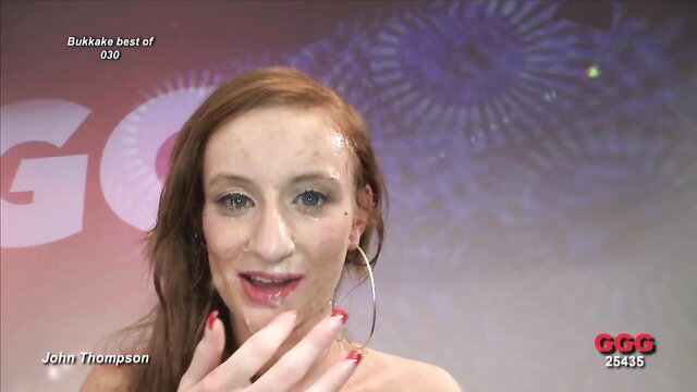 Redhead with cum-covered face in GGG Bukkake Best of 030