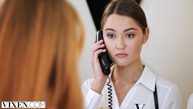Little Dragon on phone in white blouse, Hotel Vixen sexcapade