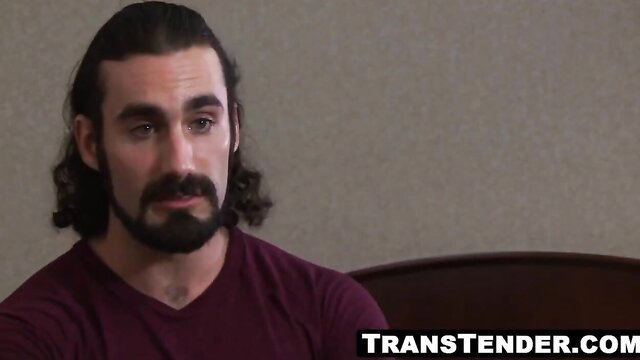 Jaxton Wheeler and TS Foxxy in intense interview gaze