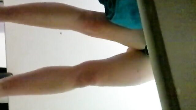 Amateur buddy's wife undresses in changing booth, spreading legs wide