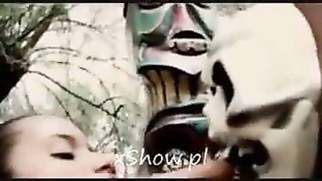 Little Lupe with green monster mask and skull mask in wild threesome