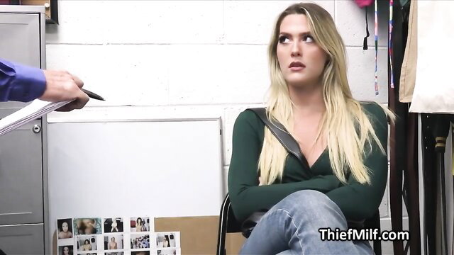 Blonde MILF in green top and jeans questioned by mall cop in office