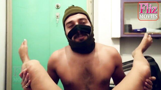 Bearded Indian man between woman's spread legs in hot threesome orgy