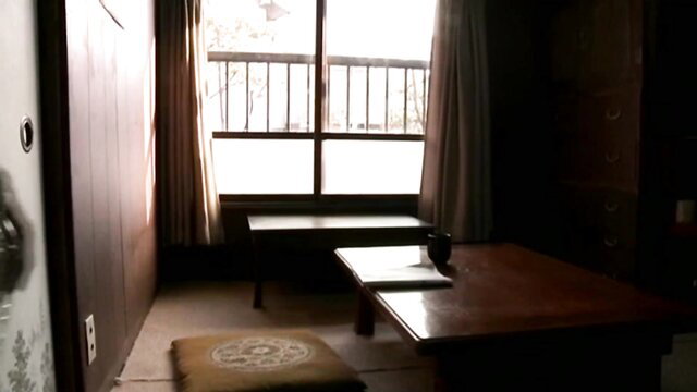 Mature middle-aged Japanese lady in serene tatami room, persistent sex vibe