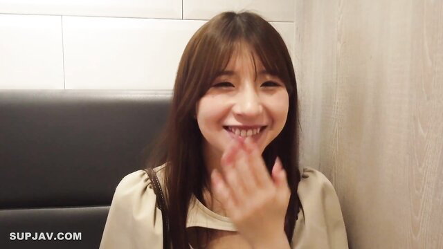 Smiling Japanese lady with bangs laughing in blouse, JAV thumbnail