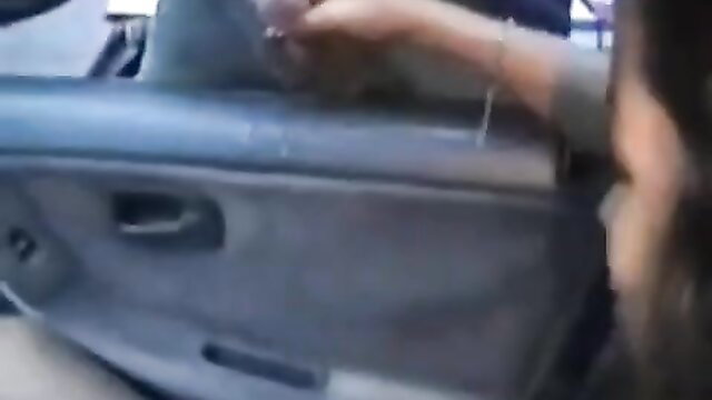 Woman giving handjob in car POV closeup