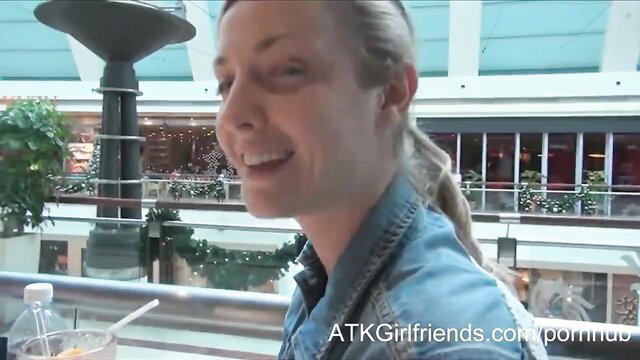 Blonde Karla Kush smiles in mall on Malaysia vacation