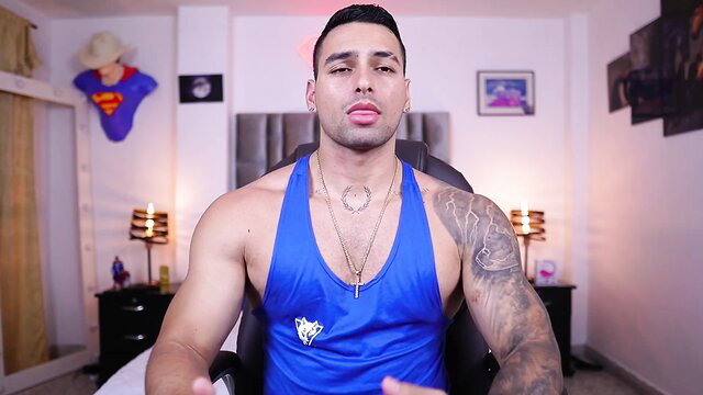 Hot Latino muscle hunk John King in tank top flexing tattoos